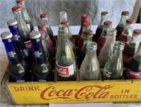 Wooden Coca Cola crate w/ full and empty bottles