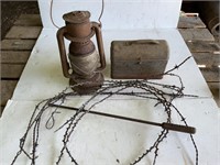Vintage lantern, lunchbox, barbed wire
