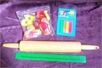 rolling pin, candles and refrig magnets