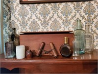 Antique bottles, jars, corkscrews