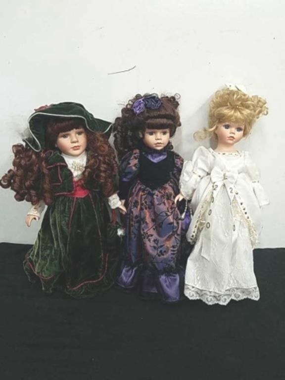 Three Collectibles 16-in dolls with stands