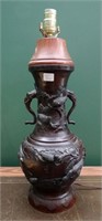 Bronze handled vase with bird & elephant motif,