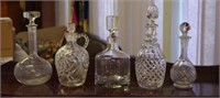 Five glass / crystal decanters