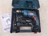 Bosch concrete hammer drill like new.