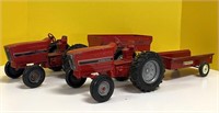 2 Ertl International toy tractors w/wagons