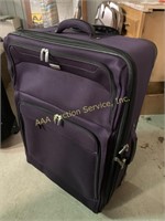 Ricardo luggage, rolls and is expandable, purple