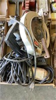 Corded shop light, corded circular saw, corded