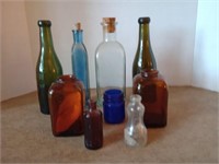 Great group of 9 vintage multicolored bottles