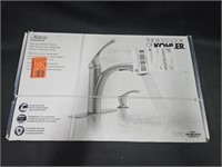 Kohler pull out kitchen faucet w/ soap dispenser.