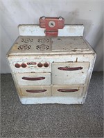 Antique child’s metal stove