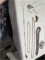 Pins, earrings, bracelet, necklaces, eyeglass