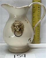 Vintage pitcher; lion