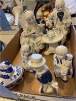 Flat of blue/white figurines, more