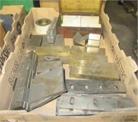Assortment of machining blocks and set-ups.