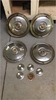 4 vintage hubcaps