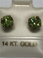 $250. 14 Kt Gold Peridot (6mm) Earrings
