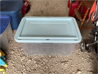 Light blue and clear 27 gallon tote