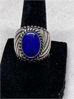 Sterling ring stamped 925 w/ blue stone, sz 5.5
