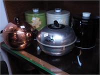 Five vintage kitchen items: two Blue Magic