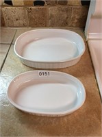 2- white oval baking dishes