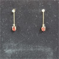 Unmarked Clear stone earrings with removable red