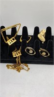 Group of matching sets of cuff links, tie chain,