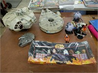 Collection of assorted Star Wars toys including