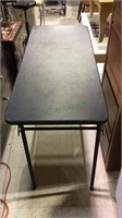 Small black hard vinyl top folding table, 48x20