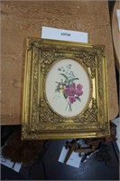 ornate gold frame with botanical print