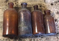 Lot of 4 Marked Brown Glass Medicine Bottles