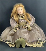 Large Seated Porcelain Doll