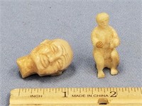 Carved ivory man, seated dancer, 1.5" and a carved