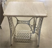 Treadle base with marble top 26” x 18” x 29”