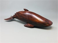 carved wood whale possibly rosewood