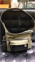 One like new drab green canvas travel bag with