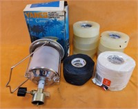 Assorted adhesive tapes and gas lantern