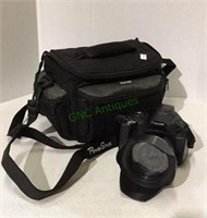 Canon SX 40HS camera with a Vivitar camera bag.