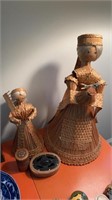 Two handmade woven straw doll figures
