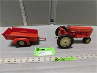 Tru-Scale toy tractor and a toy trailer