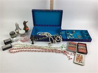 Fabric jewelry box with costume jewelry (earrings