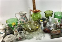 Green glass competes, ceramic pitchers, Amber
