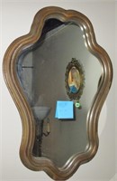 Mirror in multi-curved frame