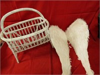 Wicker magazine rack, angel wings feathers.