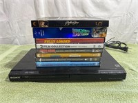 Sony DVD player and stack of DVDs