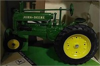 Die-cast 1934 John Deere Model A toy tractor