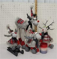 4 stuffed reindeer and candle sleeve