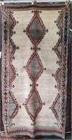 4' 3" x 8' 2" Beige & Grey Tribal Pattern Rug.