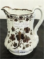 IRON STONE PITCHER WITH COPPER LUSTER LEAVES