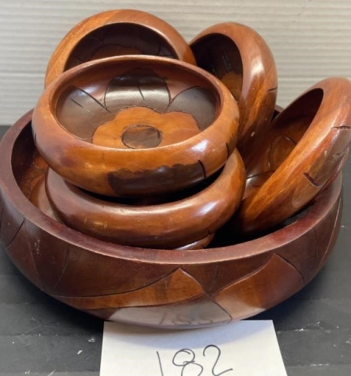 Wooden serving bowl with small bowls