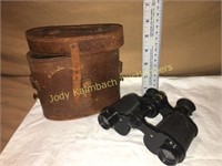 Antique prism binoculars with case